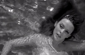 Kylie Minogue swims barely naked in her clip Flower