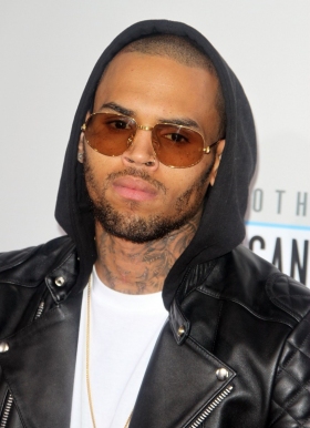 Chris Brown debuts new rap song at P. Diddy's Party