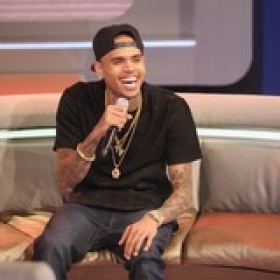 Chris Brown Likes To Party With Mystery Girl