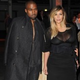 Kanye ’writing vows for Kim wedding’