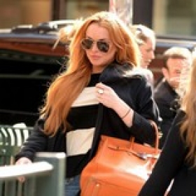 Lindsay Lohan ashamed of 'cheesy music'